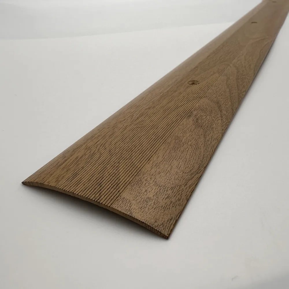 Изображение товара Стыкоперекрывающий алюминиевый порог Алком-М ПД 05 60x5.8 мм, дуб деревенский