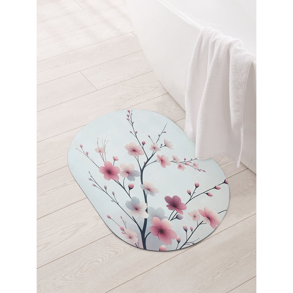 Изображение товара Коврик овальный для ванной JoyArty Ветка сакуры 58x38 см противоскользящий