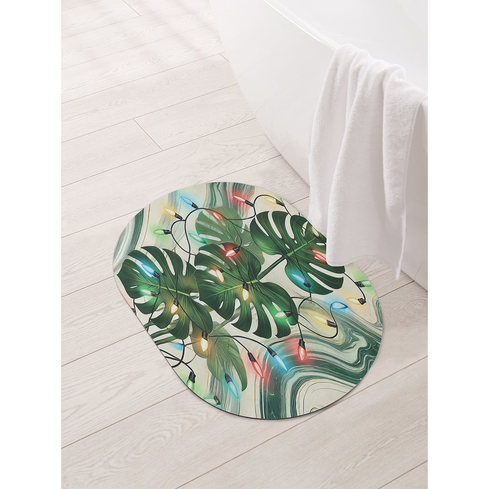 Изображение товара Коврик овальный для ванной и туалета JoyArty Монстера в огнях 58x38 см