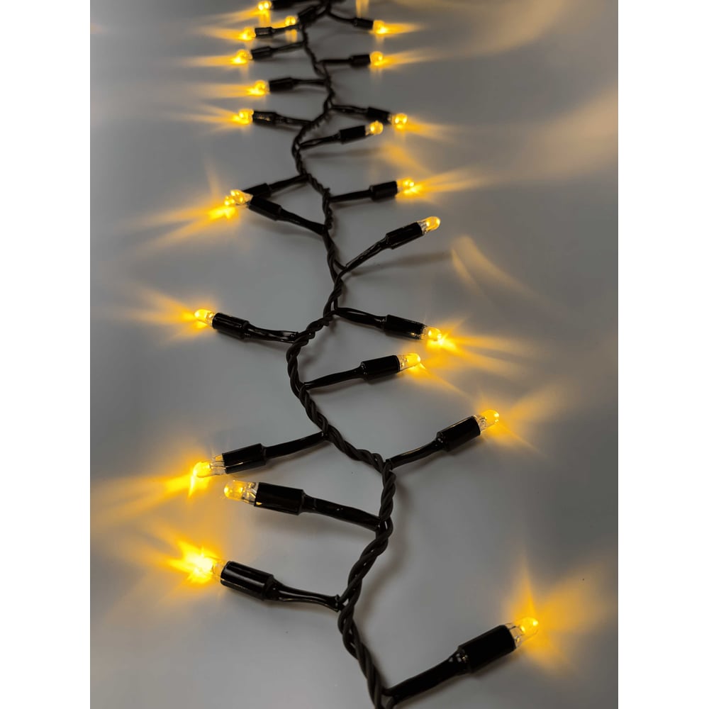 Изображение товара Гирлянда TEAMPROF Нить Мишура 10 м, 220В, ТЁПЛ.БЕЛЫЙ, черная резина 2,3мм TPF-10C/300-220V-SRB-WW