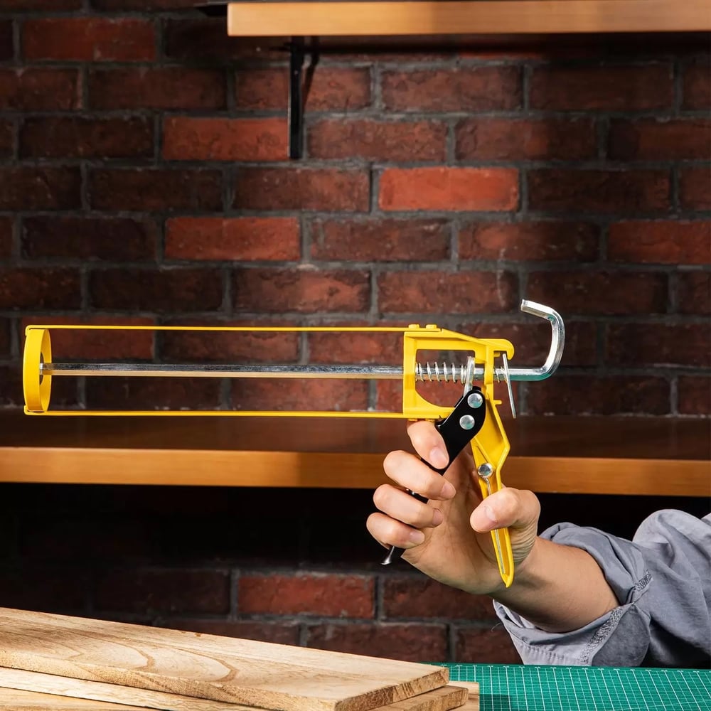 Изображение товара Пистолет для герметика DELI DL2360 98423 механический скелетный металлоконструкция