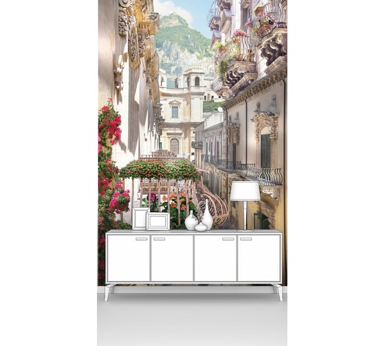 Изображение товара Фотообои ООО Первое ателье "Вид с балкона на узкую улочку старинного города с балконами в цветах" 100х150 см pw28426-1