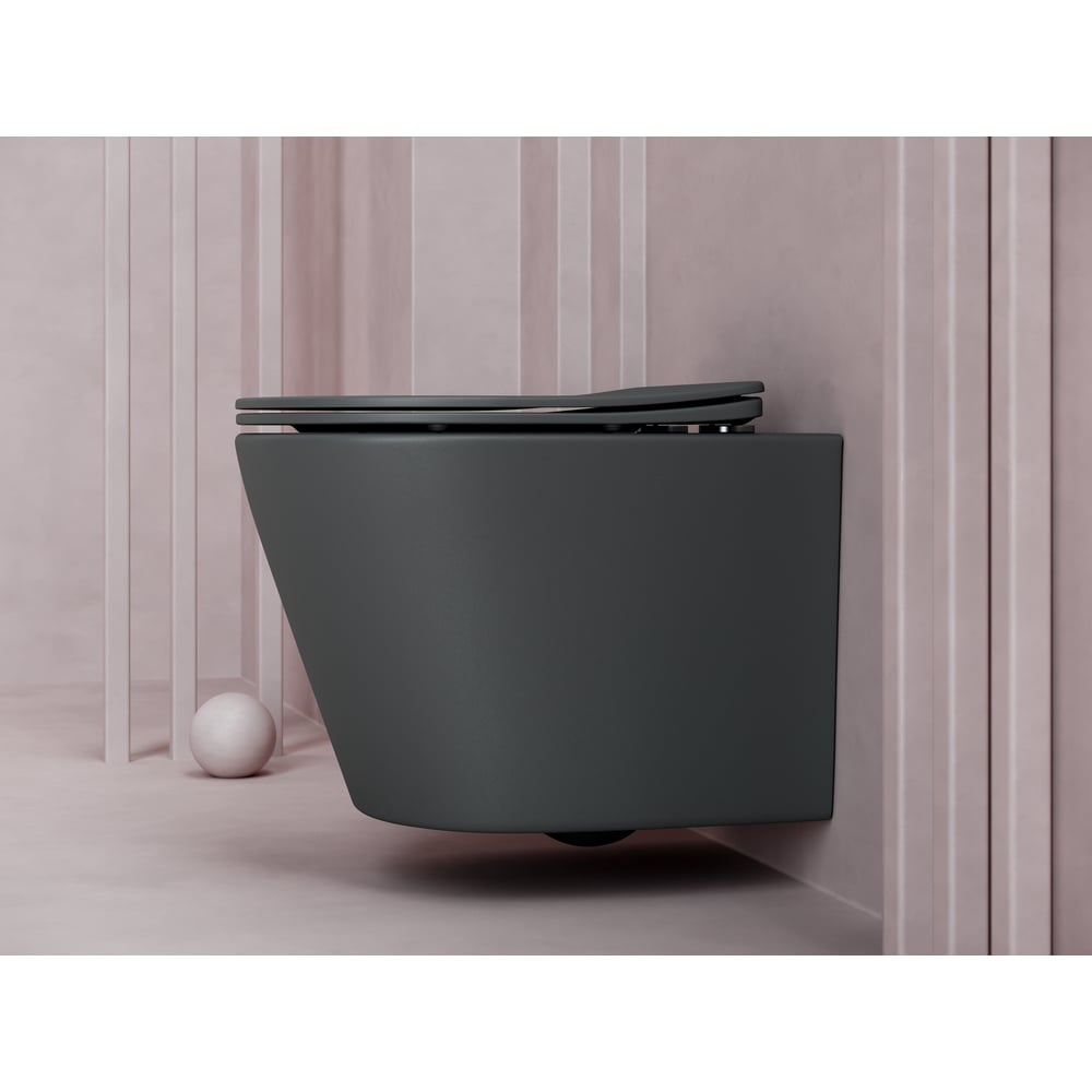 Подвесной унитаз Ceramicanova Balearica Rimless темный антрацит матовый CN6000MDH имеет современный и лаконичный дизайн. В комплекте быстросъемное сиденье из дюропласта с функцией микролифт. Механизм плавного опускания - комфорт в использовании, механизм быстрого снятия - легкость в уходе за сиденьем. Конструкция безободкового унитаза упрощает процесс уборки и повышает гигиеничность. Форма воронки унитаза предотвращает образование брызг.