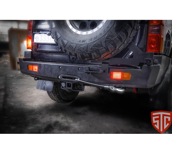 Бампер силовой задний STC Nissan Patrol Y61 1997+ с квадратом под фаркоп, площадкой для лебедки, кронштейном крепления запасного колеса справа (под штатные фары) STC-NPY61-BR-W-С2