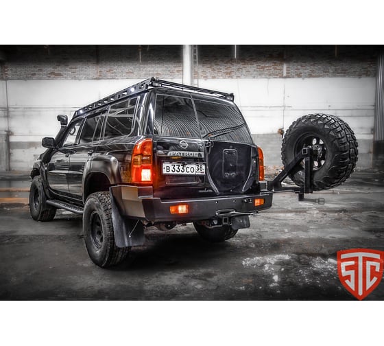 Бампер силовой задний STC Nissan Patrol Y61 1997+ с квадратом под фаркоп, площадкой для лебедки, кронштейном крепления запасного колеса справа (под штатные фары) STC-NPY61-BR-W-С2