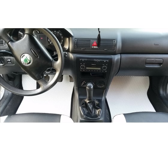 Ковры в салон автомобиля Eva Smart skoda octavia tour 1997 - 2010 эва сота коричневые c черной окантовкой 1726-A6B5-S