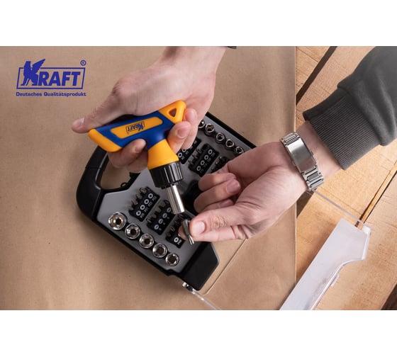 Т-образная реверсивная отвертка с битами и головками 38 предметов KRAFT KT 701041