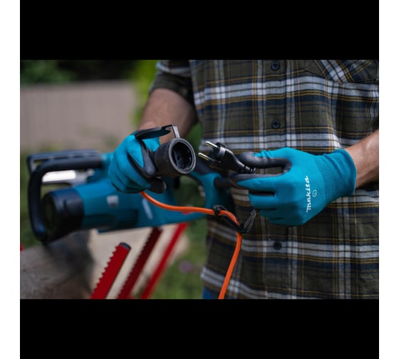 Электрическая цепная пила Makita UC4041A