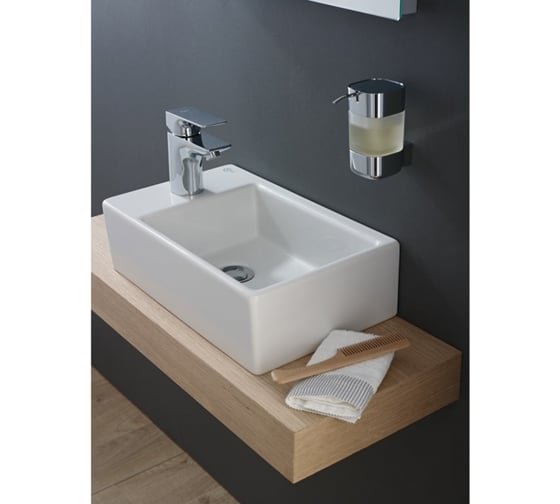 Асимметричный умывальник Ideal Standard K081701 strada 45x27 см. 1 отверстие под смеситель слева, без перелива, с крепежом 00000050316